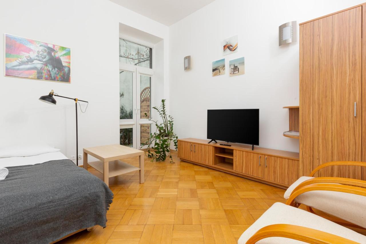 Downtown Studio Apartment By The Park By Noclegi Renters Varsovia Exterior foto